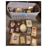 Tote with lid full of new picture frames.