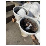 Two plastic outdoor planters