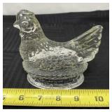 Clear pressed glass top piece hen on a nest