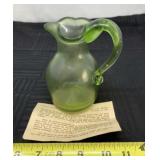 Hand blown green pitcher from Jamestown, Virginia