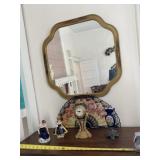 Mirror, fan, vase, clock and figurines.