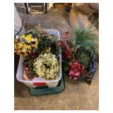 Tote with lid and artificial flowers.