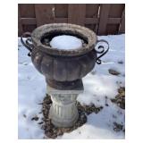 Resin planter on concrete pedestal