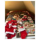 Christmas decor, including tree, scarf, hats,