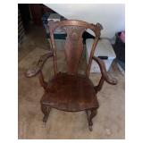 antique hardwood rocking chair with carved