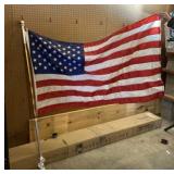 American flag with porch flag pole.