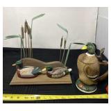Duck wall hanging and stein.