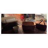Picnic baskets with supplies and a basket without