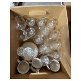 Box of wine, glasses, cups, and saucers