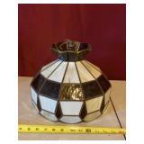 Stained glass lamp shade with cord cut.