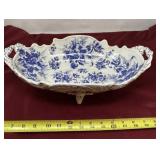 Blue and white porcelain bowl with angel handles.