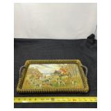 Vintage serving tray with fox hunting scene.