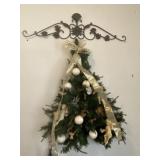 Iron hanging decor, wood shelf and Christmas tree