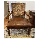 Jacobean Style leather and tapestry arm chair.