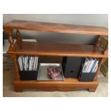 Three tier solid maple bookshelf with contents,