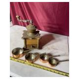 Vintage coffee grinder with heavy measuring cups,
