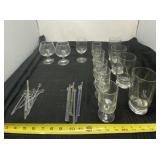 Glass drink stirrers, brandy glasses and drinking