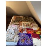 Bed full of souvenirs from around the world also