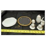 Made in China mini tea pot set. Handle is broke