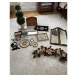Mirrors, Lincoln sign, artificial plant decor and