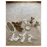 Angel figurines, mirror and framed picture.