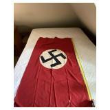 29 x 49 WWII NSDSP German flag with a hole in it.