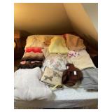 Afghans and blankets and some pillows