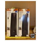 Two used Lasko digital ceramic tower heaters.