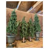 Four light up Christmas trees.