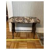 16 inch high ornate cast iron foot stool.
