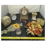 Clocks, artificial flower decor and keepsake box.