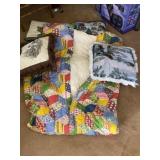 Pillows and quilt sleeping bag.
