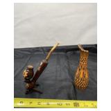 Zurich peace pipe and carved wood vase.