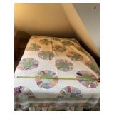 Handmade quilt 86 x 68 has small stain.