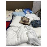 Pillows, blankets and throw.