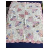 36 x 46 baby quilt with some stains