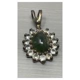 14 karat gold filled pendant with rhinestones,