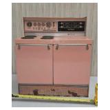 1950s Wolverine pink tin metal toy stove,