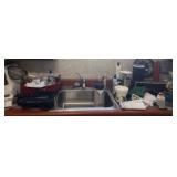 All contents on cabinet only including clock,