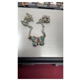 Unmarked sterling silver with crushed turquoise