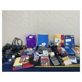 Office supplies including stapler, pens, desk