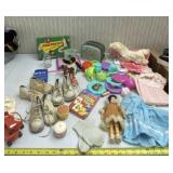 Vintage baby shoes, doll clothes, toys and games.