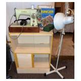 Singer Model 15-125 sewing machine in a seafoam