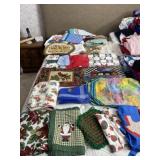 Tablecloths, place mats, aprons and table