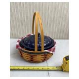 2002 Longaberger basket with pottery dish.