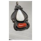 Navajo sterling silver pendant featuring mother