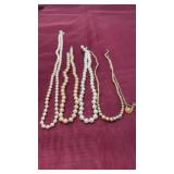 Pearls some nodded some with sterling silver