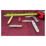 Assortment of pocket knives are cutting edge