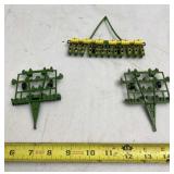 John Deere plows and planter scale models.