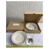 Two Longaberger 6 inch pie plates in boxes.
